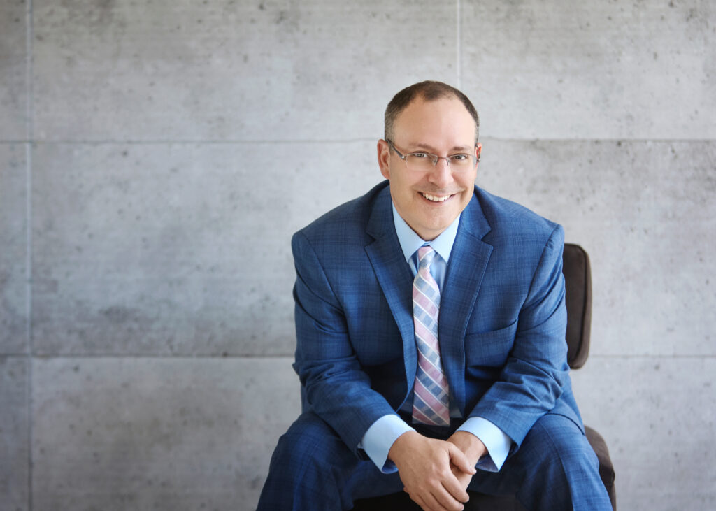 man sitting in a suit