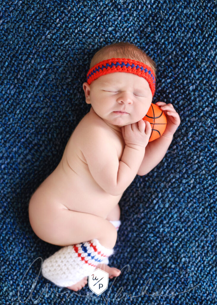 newborn in basketball outfit